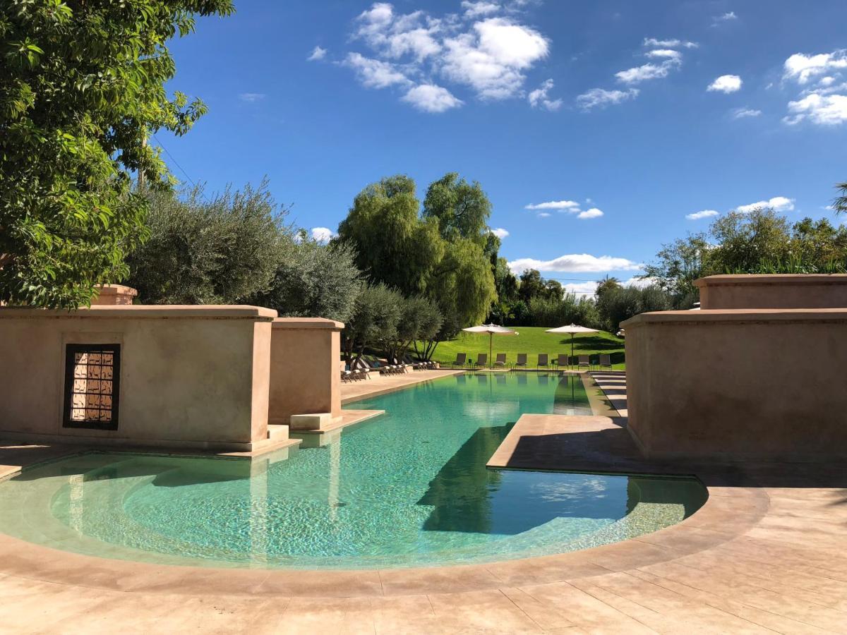 Les Deux Tours Hotel Marrakesh Exterior photo The swimming pool at the Ouarzazate Hotel