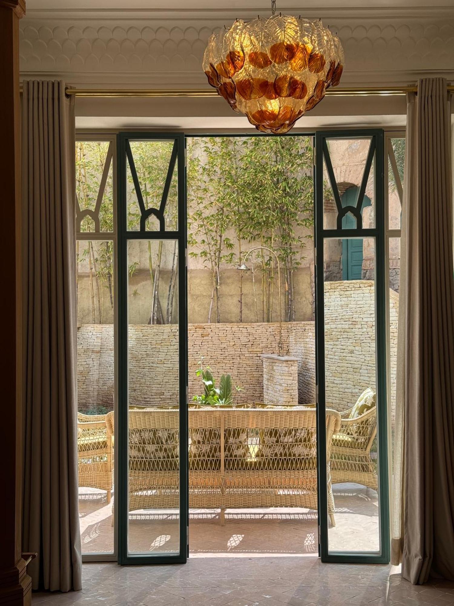 Les Deux Tours Hotel Marrakesh Exterior photo A view of the courtyard from the living room